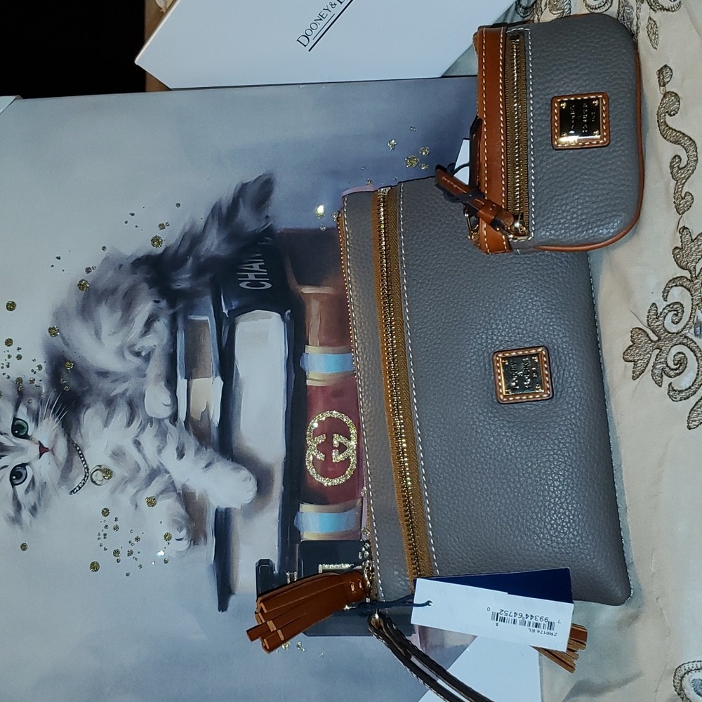 NWT Dooney and Burke phone Wristlet and coin pouch both in Elephant color.